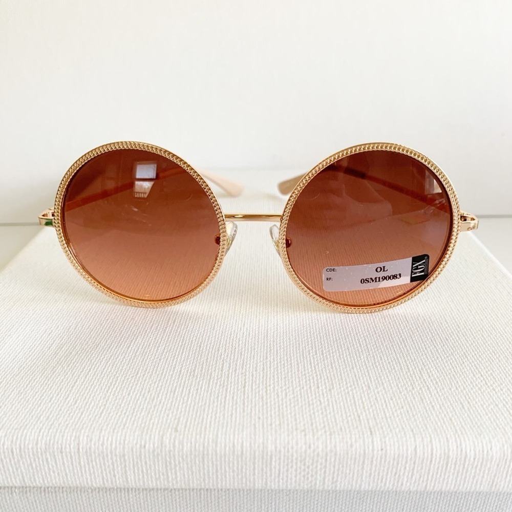 New with tage FGX rose gold round sunglasses